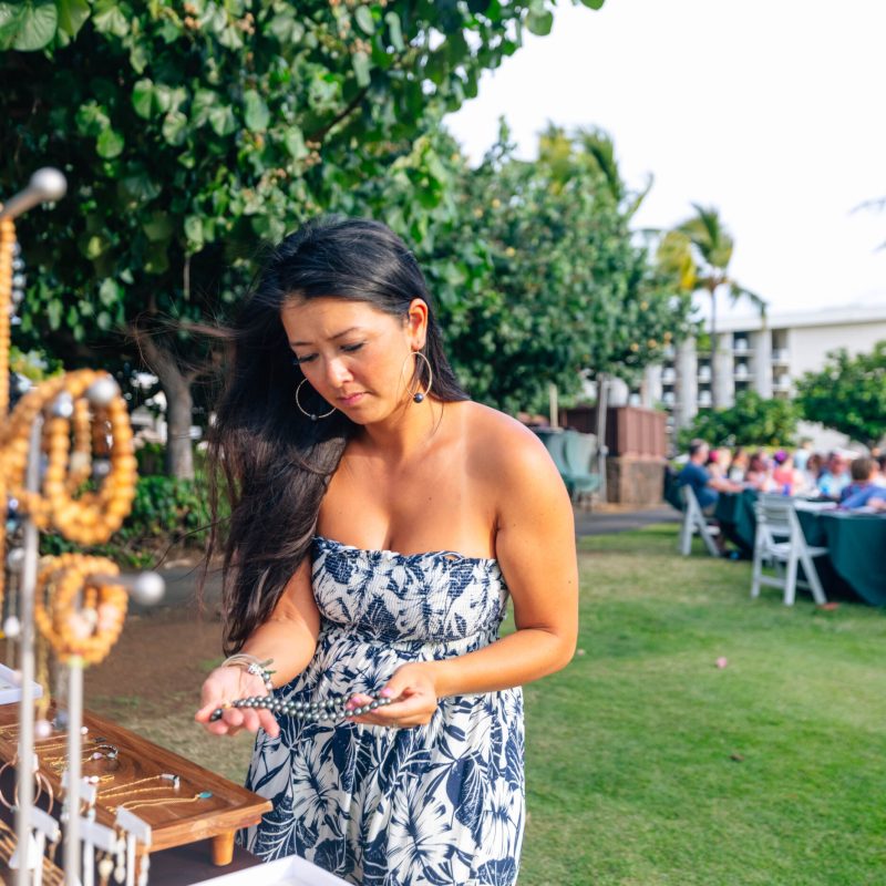 a person that is standing in the grass